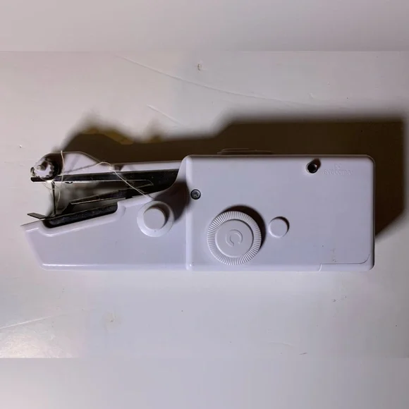 Compact White Handheld Sewing Machine - Picture 6 of 6